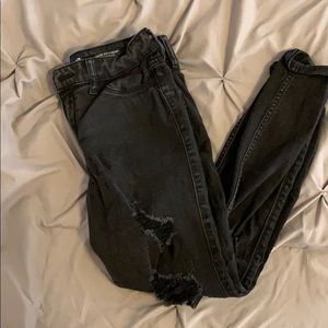 High rise black ripped jeans